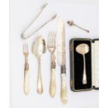 A quantity of silver flatware to include: boxed pusher, Birmingham, 1939; sauce spoon, Mappin & Webb