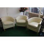 Three contemporary cream leather upholstered tub chairs, 73cm high, 82cm wide (3)