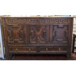 A Queen Anne period joined oak mule chest, circa 1710, the plank lid opening to reveal storage