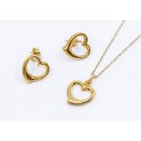 A 9ct gold pendant and earring set comprising a heat shaped open work pendant, width approx.