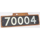 A mounted railway plate, possibly replica, '70004', upon wooden board, measuring approx. 64cm x