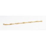 A 9ct gold fancy bracelet, comprising lozenge and wrapped links, length approx 8'', weight approx