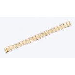 A 9ct gold fancy link bracelet, comprising articulated rectangular pierced links with textured