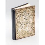 A Modern leather bound sterling silver mounted bible (New Testament), the cover chased with