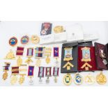 Large collection of Masonic medals mostly in cases and boxes. Yellow metal gilt on silver, including