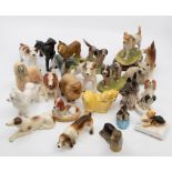 A collection of bone china model of dogs to include: Wade Championship series, other Wade, Beswick