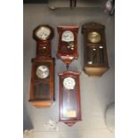 Five various wall clocks, comprising two early 20th Century wall clocks, plus three modern wall