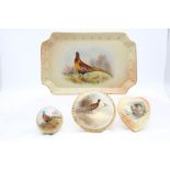 A group of early 20th Century blush ivory dressing table ware, all decorated with Pheasants, to