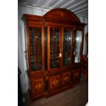A good Sheraton style breakfront display cabinet with shaped cornice and breakfront with central