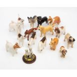 A collection of Beswick dogs to include: Foxhounds & a Fox, Corgi, Poodle, Pug, Collie, Golden