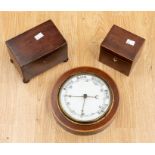 Two George III mahogany tea caddy's along with an early 20th century round wall barometer.