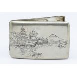 A Japanese silver cigarette case, engraved with Japanese landscapes to the exterior and interior,