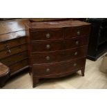 An early Victorian bow fronted chest of drawers, fitted with two short drawers over three long
