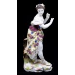 A late 19th Century Rudolstadt Volkstedt porcelain allegorical figure of a Lady, with wreath head