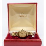A 9ct Omega Ladies' watch,round gold tone dial, approx 22mm, applied baton markers, to an