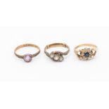 Three various 9ct gold dress rings, comprising sapphire and white stone flower head ring, amethyst