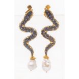 A pair of sapphire and fresh water pearl silver gilt drop earrings in the form of a serpent, the