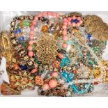 A collection of vintage costume  jewellery to include 1920's-1950's glass bead necklaces, pendants