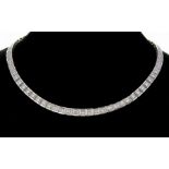 A diamond and 18ct white gold line necklace collar, comprising graduated articulated box links,