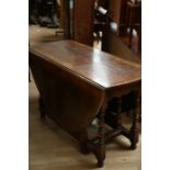 A 17th Century style joined oak gateleg table, of recent manufacture, two leaf form, fitted with a