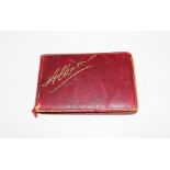 A late Victorian/early Edwardian leather bound album belonging to Maud and dated 10.3.99, almost