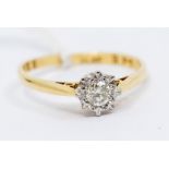 A diamond and 18ct gold solitaire ring, the diamond approx. 0.15ct, illusion set, size L, total