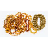 A collection of amber necklaces to include six amber bead necklaces, comprising various shapes of
