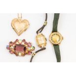 A yellow metal heart shaped locket on fine chain, probably 9ct gold, weight approx. 8.3gms a/f