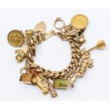 A 9ct gold charm bracelet to comprising  various 9ct gold and unmarked yellow metal charms, to