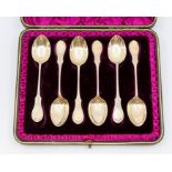 A set of six Victorian silver shaped fiddle pattern teaspoons, engraved decoration by Hilliard &