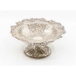 A Late Victorian silver pedestal dish decorated throughout with floral foliage embossing and pierced