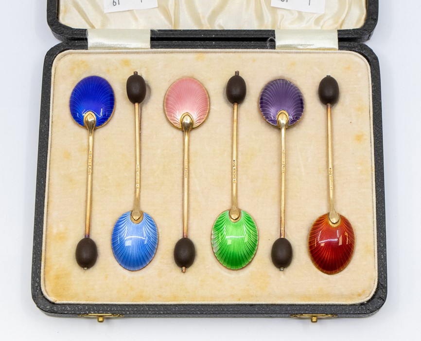 A harlequin set of six George VI silver gilt and enamel coffee spoons, bean terminal, Birmingham,