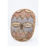 An African Tribal mask, geometric pattern, blue heightening  Provenance: from a Private collection