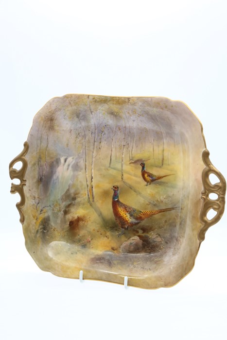 A Royal Worcester two handled cake plate, the body painted with Pheasants in woodland with