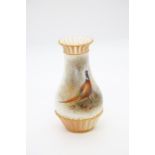 A Royal Worcester blush ivory vase, shape no: G 1061, painted with a cock pheasant in landscape,