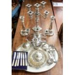 A collection of plated items to include candlesticks, large tray, candelabra, butter dish, teapot