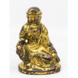 A gilded bronze buddha, probably Tibetan, approx 15cm high, approx 896gms