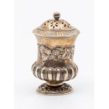 A George IV silver gilt campana shaped caster, the body with engraved floral border, gadroon section