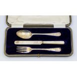An early 20th Century silver matched three piece Christening set,  mother-of-pearl handle to