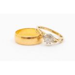 A 22ct gold wedding band, size N, weight approx. 4.9 grams, along with a 9ct gold white paste