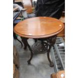 A Gaskell and Chambers cast iron mahogany topped pub table, probably 19th Century, 71cm high, 61cm