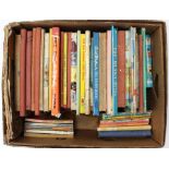 ***WITHDRAWN*** A collection of assorted books to include annuals, Enid Blyton and others, varying