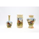 A collection of early 20th Century Locke & Co.. Worcester blush ivory vases, each painted with a