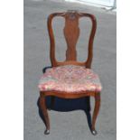 A Dutch 18th Century mahogany side chair, pegged mortise and tenon construction, the crest rail