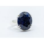 A sapphire and silver dress ring, comprising an oval cut sapphire approx 14 x 18mm, size N1/2,