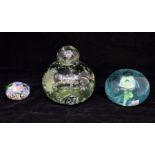 ***AUCTIONEER TO ANNOUNCE LOT WITHDRAWN*** A green glass bubble 'dump''; a green glass paperweight;