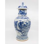 19th century blue and white Chinese lidded urn vase with dragon detail. (AF)