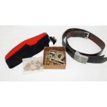 A German leather Belt with a swastica buckle, a Military Cap plus a collected of assorted belt