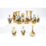 A group of late 19th Century Locke & Co Worcester small posy vases, all painted with a Pheasant,