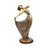 An Art Deco style lacquered ceramic large figure of a Dancer